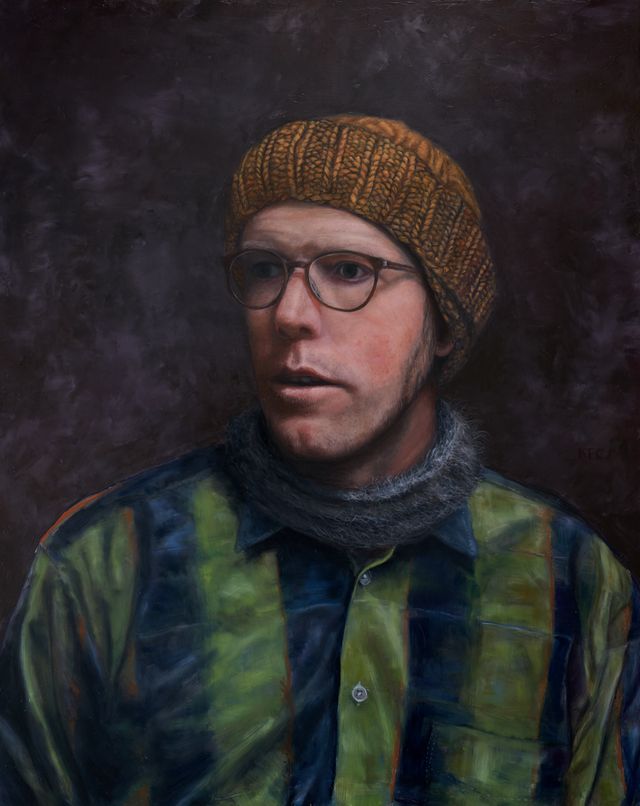 Self portrait of myself, Kyle Cunningham wearing a knit yellow cap.
