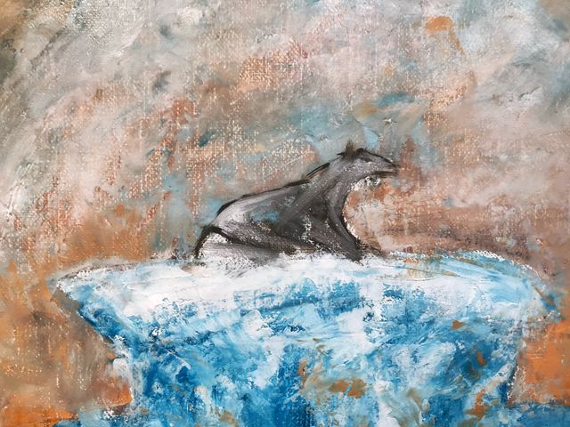 Close up of the rough first layer of a painting of a polar bear.